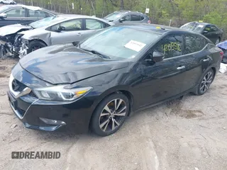 2016 Nissan Maxima Platinum with VIN 1N4AA6AP9GC391227, listed as a IAAI auction lot 42013542 with 169,016 mi miles and . Bid and sale history available at DreamBid. Image 2.