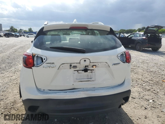 2014 Mazda CX-5 Sport with VIN JM3KE2BE9E0344990, listed as a Copart auction lot 59014145 with 126,905 mi miles and Salvage title. Bid and sale history available at DreamBid. Image 6.