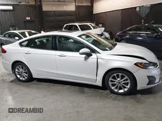 2020 Ford Fusion SE z VIN 3FA6P0LU8LR142370, wystawiony jako IAAI lot #42457342 z przebiegiem 53 808 mil mil oraz . Historia ofert i sprzedaży dostępna na DreamBid. Obrazek 13.