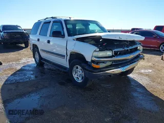 2004 Chevrolet Tahoe LT with VIN 1GNEC13Z44R323201, listed as a IAAI auction lot 41481138 with 216,869 mi miles. Bid and sale history available at carsss.com. Image 1.