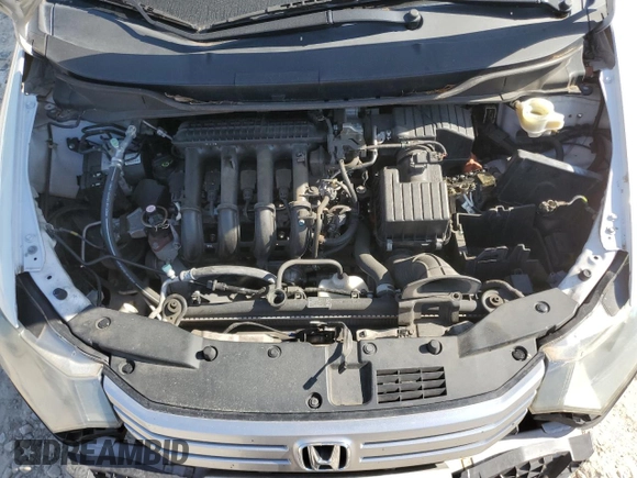 2010 Honda Insight EX z VIN JHMZE2H77AS035113, wystawiony jako Copart lot #54179005 z przebiegiem 165 083 mil mil oraz Szkoda całkowita • Salvage title. Historia ofert i sprzedaży dostępna na DreamBid. Obrazek 11.