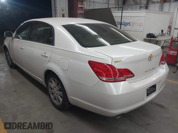 2005 Toyota Avalon XL with VIN 4T1BK36B55U013349, listed as a IAAI auction lot 41879384 with 185,821 mi miles and . Bid and sale history available at DreamBid. Image 3.