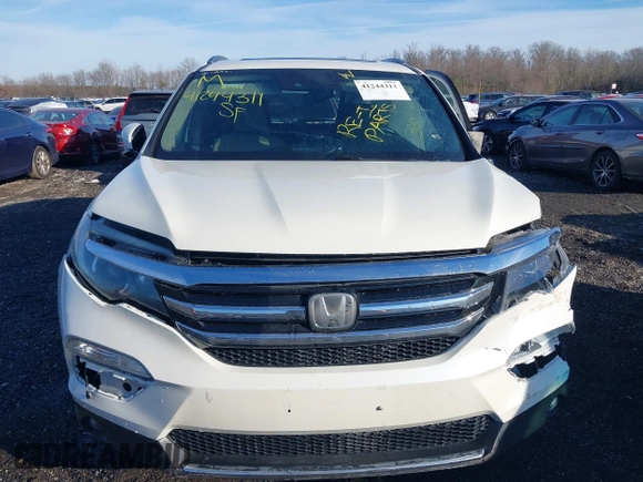 2017 Honda Pilot Touring with VIN 5FNYF6H98HB102313, listed as a IAAI auction lot 41244311 with 106,931 mi miles. Bid and sale history available at carsss.com. Image 13.
