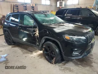 2019 Jeep Cherokee Latitude Plus with VIN 1C4PJMLX7KD283570, listed as a IAAI auction lot 41922700 with 106,829 mi miles. Bid and sale history available at carsss.com. Image 1.