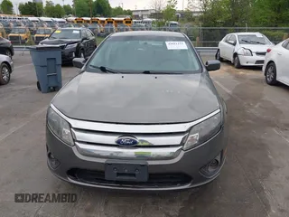 2011 Ford Fusion SE with VIN 3FAHP0HA1BR203046, listed as a IAAI auction lot 42011121 with 302,078 mi miles. Bid and sale history available at carsss.com. Image 13.