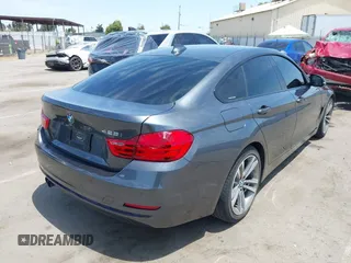 2015 BMW 4 Series 428i with VIN WBA4A5C59FG052596, listed as a IAAI auction lot 42649927 with 68,842 mi miles and . Bid and sale history available at DreamBid. Image 4.
