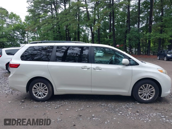 2016 Toyota Sienna XLE with VIN 5TDYK3DC9GS756582, listed as a IAAI auction lot 42506733 with 155,678 mi miles and . Bid and sale history available at DreamBid. Image 13.