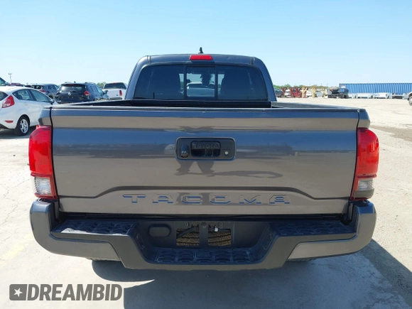 2020 Toyota Tacoma SR with VIN 3TYRX5GNXLT002488, listed as a IAAI auction lot 41973584 with 76,169 mi miles and . Bid and sale history available at DreamBid. Image 17.