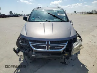 2013 Dodge Journey SE с VIN 3C4PDCAB9DT656887, выставлен на аукционе Copart как лот 54791315 с пробегом 130 394 миль миль и Списание • Salvage title. История ставок и продаж доступна на DreamBid. Изображение 5.