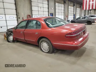 1997 Lincoln Continental with VIN 1LNLM97V9VY616128, listed as a Copart auction lot 48687805 with 61,591 mi miles and Salvage Title. Bid and sale history available at carsss.com. Image 2.