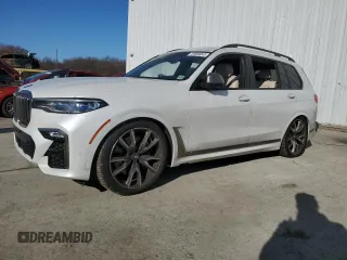 2021 BMW X7 M50i with VIN 5UXCX6C07M9E62761, listed as a Copart auction lot 49589045 with 31,127 mi miles and Salvage Title. Bid and sale history available at carsss.com. Image 1.