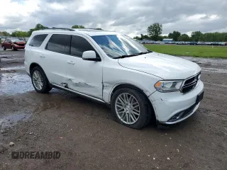 2015 Dodge Durango Limited with VIN 1C4RDJDG8FC861331, listed as a Copart auction lot 58251445 with 131,950 mi miles and Salvage title. Bid and sale history available at DreamBid. Image 4.