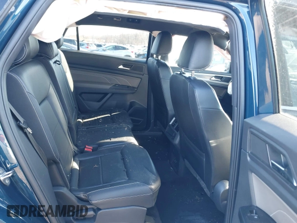2021 Volkswagen Atlas SE with VIN 1V2JE2CA5MC206701, listed as a IAAI auction lot 41165558 with 52,631 mi miles and . Bid and sale history available at DreamBid. Image 8.