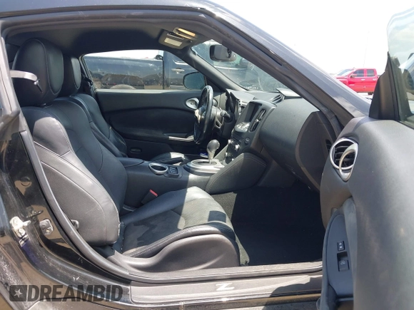 2012 Nissan 370Z z VIN JN1AZ4EH1CM564630, wystawiony jako IAAI lot #42177880 z przebiegiem 173 751 mil mil oraz . Historia ofert i sprzedaży dostępna na DreamBid. Obrazek 5.