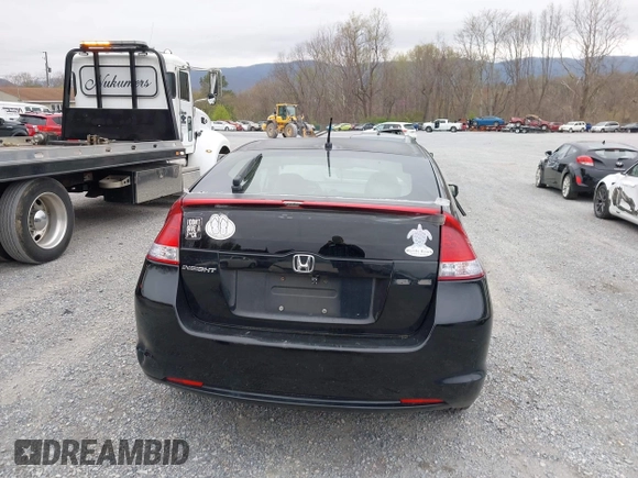 2010 Honda Insight EX with VIN JHMZE2H73AS002299, listed as a IAAI auction lot 41900761 with 251,934 mi miles and . Bid and sale history available at DreamBid. Image 16.