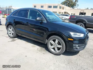 2015 Audi Q3 2.0T Premium Plus with VIN WA1EFCFSXFR013237, listed as a IAAI auction lot 41850031 with 85,293 mi miles. Bid and sale history available at carsss.com. Image 1.