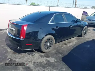 2008 Cadillac CTS RWD z VIN 1G6DF577180143506, wystawiony jako IAAI lot #42422201 z przebiegiem 157 003 mil mil oraz . Historia ofert i sprzedaży dostępna na DreamBid. Obrazek 4.