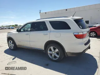 2012 Dodge Durango Citadel with VIN 1C4SDJET7CC309313, listed as a Copart auction lot 56491065 with 154,116 mi miles and Salvage title. Bid and sale history available at DreamBid. Image 2.