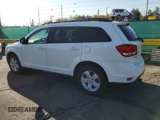 2012 Dodge Journey SXT z VIN 3C4PDCBG0CT364005, wystawiony jako Copart lot #55636265 z przebiegiem 150 048 mil mil oraz Szkoda całkowita • Salvage title. Historia ofert i sprzedaży dostępna na DreamBid. Obrazek 2.