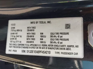 2023 Tesla Model 3 with VIN 5YJ3E1EA8PF454210, listed as a IAAI auction lot 42326822 with 43,200 mi miles and . Bid and sale history available at DreamBid. Image 9.