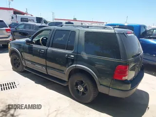 2002 Ford Explorer XLT z VIN 1FMZU63WX2ZC13479, wystawiony jako IAAI lot #42793555 z przebiegiem 206 581 mil mil oraz . Historia ofert i sprzedaży dostępna na DreamBid. Obrazek 3.