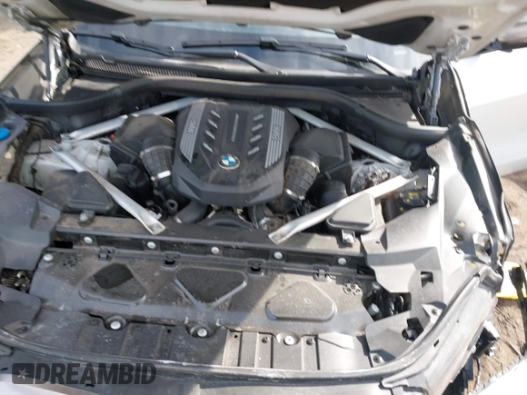 2020 BMW X5 M50i with VIN 5UXJU4C06LLE45651, listed as a IAAI auction lot 41618355 with 70,885 mi miles and . Bid and sale history available at DreamBid. Image 10.