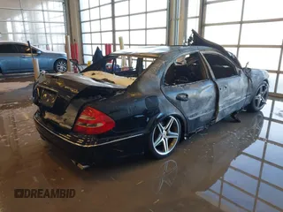 2003 Mercedes-Benz E-Class 5.5L AMG with VIN WDBUF76J73A327193, listed as a IAAI auction lot 41282703 with 1 mi miles. Bid and sale history available at carsss.com. Image 4.