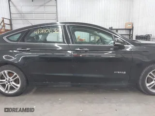 2015 Ford Fusion Titanium Hybrid with VIN 3FA6P0RU2FR309074, listed as a IAAI auction lot 41240630 with 172,025 mi miles. Bid and sale history available at carsss.com. Image 14.