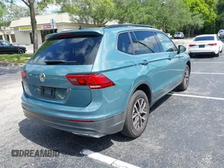 2019 Volkswagen Tiguan SE with VIN 3VV3B7AX8KM171057, listed as a IAAI auction lot 42209509 with 99,437 mi miles and . Bid and sale history available at DreamBid. Image 4.