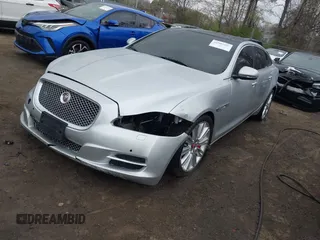 2015 Jaguar XJ with VIN SAJWA2GZ8F8V83551, listed as a IAAI auction lot 41909403 with 112,098 mi miles. Bid and sale history available at carsss.com. Image 2.