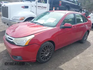2009 Ford Focus SES with VIN 1FAHP36N59W111369, listed as a IAAI auction lot 41936020 with 173,079 mi miles. Bid and sale history available at carsss.com. Image 2.