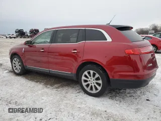 2013 Lincoln MKT with VIN 2LMHJ5FK1DBL51879, listed as a Copart auction lot 45167125 with 126,658 mi miles and Salvage Title. Bid and sale history available at DreamBid. Image 2.