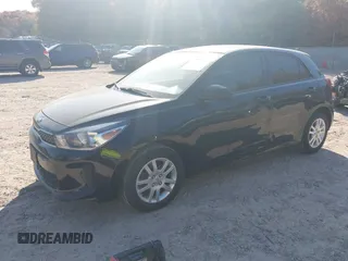 2020 Kia Rio S with VIN 3KPA25AD5LE334856, listed as a IAAI auction lot 40650463 with 163,076 mi miles and . Bid and sale history available at DreamBid. Image 2.