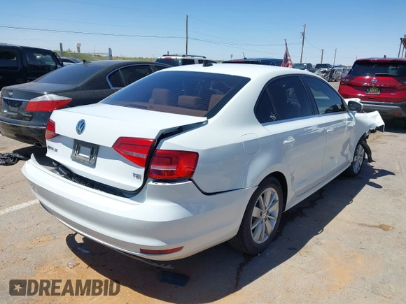 2015 Volkswagen Jetta SE z VIN 3VWD07AJ5FM346565, wystawiony jako IAAI lot #42104880 z przebiegiem 93 491 mil mil oraz . Historia ofert i sprzedaży dostępna na DreamBid. Obrazek 4.