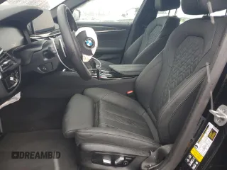 2023 BMW 5 Series 530i xDrive with VIN WBA13BJ0XPWY20712, listed as a Copart auction lot 86109994 with 9,489 mi miles and Salvage Title. Bid and sale history available at DreamBid. Image 7.