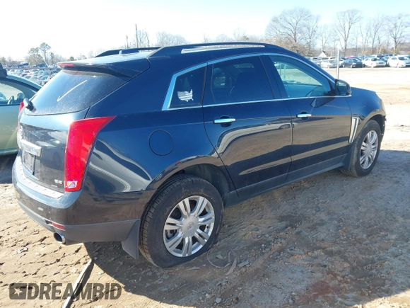 2015 Cadillac SRX with VIN 3GYFNAE35FS608595, listed as a IAAI auction lot 41282751 with 127,055 mi miles and . Bid and sale history available at DreamBid. Image 4.