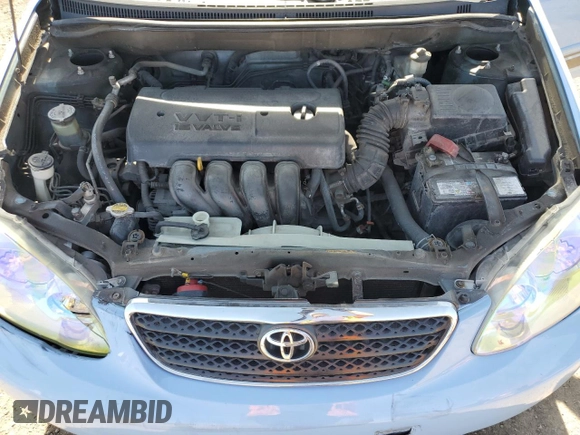 2005 Toyota Corolla CE z VIN 2T1BR32E85C845622, wystawiony jako Copart lot #52092805 z przebiegiem 192 023 mil mil oraz Nie do naprawy • Non repairable. Historia ofert i sprzedaży dostępna na DreamBid. Obrazek 11.