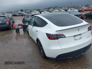 2023 Tesla Model Y Performance with VIN 7SAYGDEF7PF807312, listed as a IAAI auction lot 41711068 with 25,029 mi miles and . Bid and sale history available at DreamBid. Image 3.