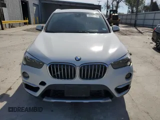 2019 BMW X1 sDrive28i with VIN WBXHU7C52K3H44195, listed as a Copart auction lot 42304175 with 88,929 mi miles and Salvage Title. Bid and sale history available at carsss.com. Image 5.