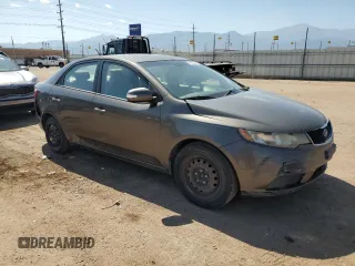 2010 Kia Forte EX with VIN KNAFU4A22A5880772, listed as a Copart auction lot 71679444 with 150,734 mi miles and Salvage Title. Bid and sale history available at carsss.com. Image 4.