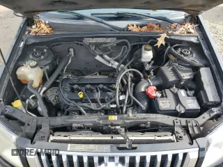 2009 Mercury Mariner Premier z VIN 4M2CU87719KJ20338, wystawiony jako Copart lot #42972595 z przebiegiem 148 871 mil mil oraz Szkoda całkowita • Salvage title. Historia ofert i sprzedaży dostępna na DreamBid. Obrazek 12.