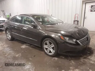 2015 Volkswagen CC R-Line with VIN WVWBP7AN0FE829797, listed as a IAAI auction lot 41296150 with 138,608 mi miles and . Bid and sale history available at DreamBid. Image 1.
