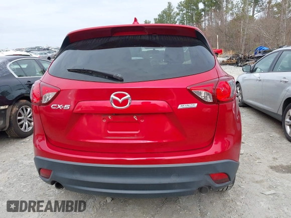 2016 Mazda CX-5 Touring z VIN JM3KE2CY3G0894441, wystawiony jako IAAI lot #41508767 z przebiegiem 88 554 mil mil oraz . Historia ofert i sprzedaży dostępna na DreamBid. Obrazek 16.