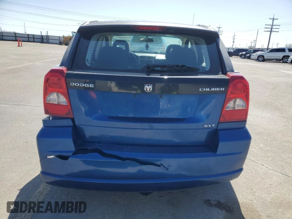 2009 Dodge Caliber SXT with VIN 1B3HB48A99D157051, listed as a Copart auction lot 52098965 with 188,268 mi miles and Salvage Title. Bid and sale history available at carsss.com. Image 6.