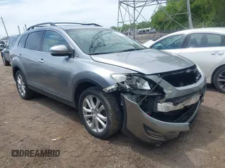2011 Mazda CX-9 Grand Touring with VIN JM3TB3DV2B0332191, listed as a IAAI auction lot 42211435 with 155,801 mi miles and . Bid and sale history available at DreamBid. Image 1.