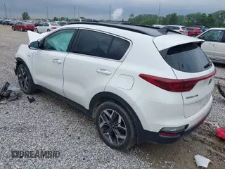 2022 Kia Sportage EX with VIN KNDPNCAC7N7981212, listed as a IAAI auction lot 42530071 with 86,176 mi miles and . Bid and sale history available at DreamBid. Image 3.