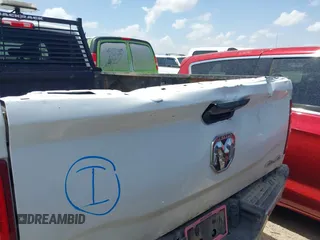 2022 Ram 2500 Tradesman with VIN 3C6UR5HJXNG117791, listed as a IAAI auction lot 42508516 with 61,463 mi miles and . Bid and sale history available at DreamBid. Image 6.