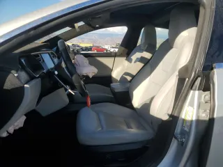 2016 Tesla Model S 90D with VIN 5YJSA1E26GF147974, listed as a Copart auction lot 82815404 with 126,609 mi miles and Salvage Title. Bid and sale history available at DreamBid. Image 7.