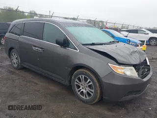 2012 Honda Odyssey EX z VIN 5FNRL5H44CB001421, wystawiony jako IAAI lot #42223783 z przebiegiem 161 759 mil mil oraz . Historia ofert i sprzedaży dostępna na DreamBid. Obrazek 1.