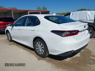 2021 Toyota Camry Hybrid LE with VIN 4T1C31AK2MU027513, listed as a IAAI auction lot 41856681 with 85,779 mi miles. Bid and sale history available at carsss.com. Image 3.